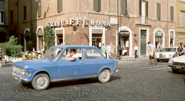 scena al gran caffé roma a febbre da cavallo