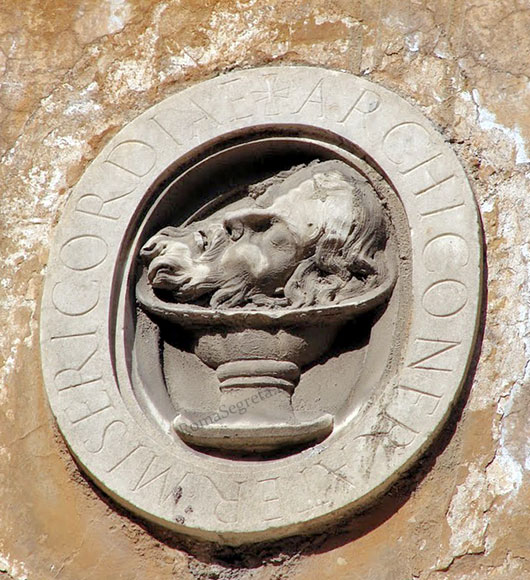 rilievo con testa di san giovanni