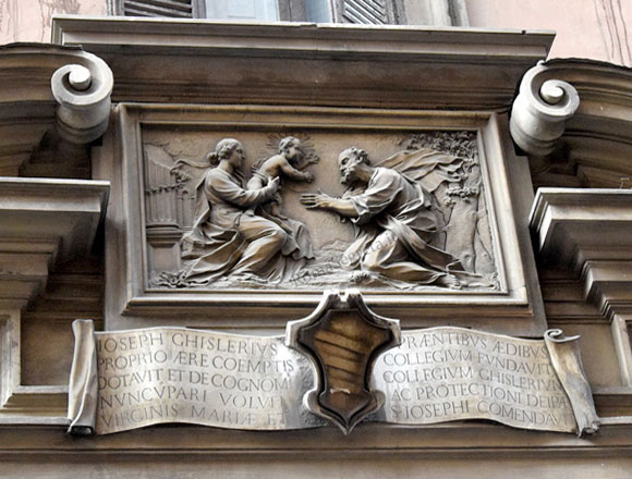 bassorilievo con la sacra famiglia ed iscrizione