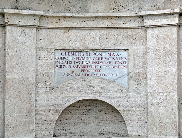 lapide di clemente XI alla fontana dell'acqua acetosa