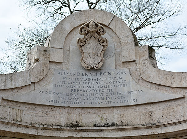 lapide e stemma di alessandro VII alla fontana dell'acqua acetosa